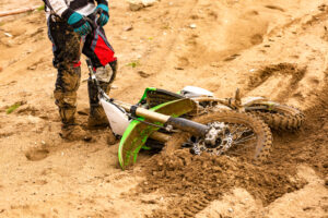 Close up,Of,Accident,In,Mountain,Bikes,Race,In,Dirt,Track