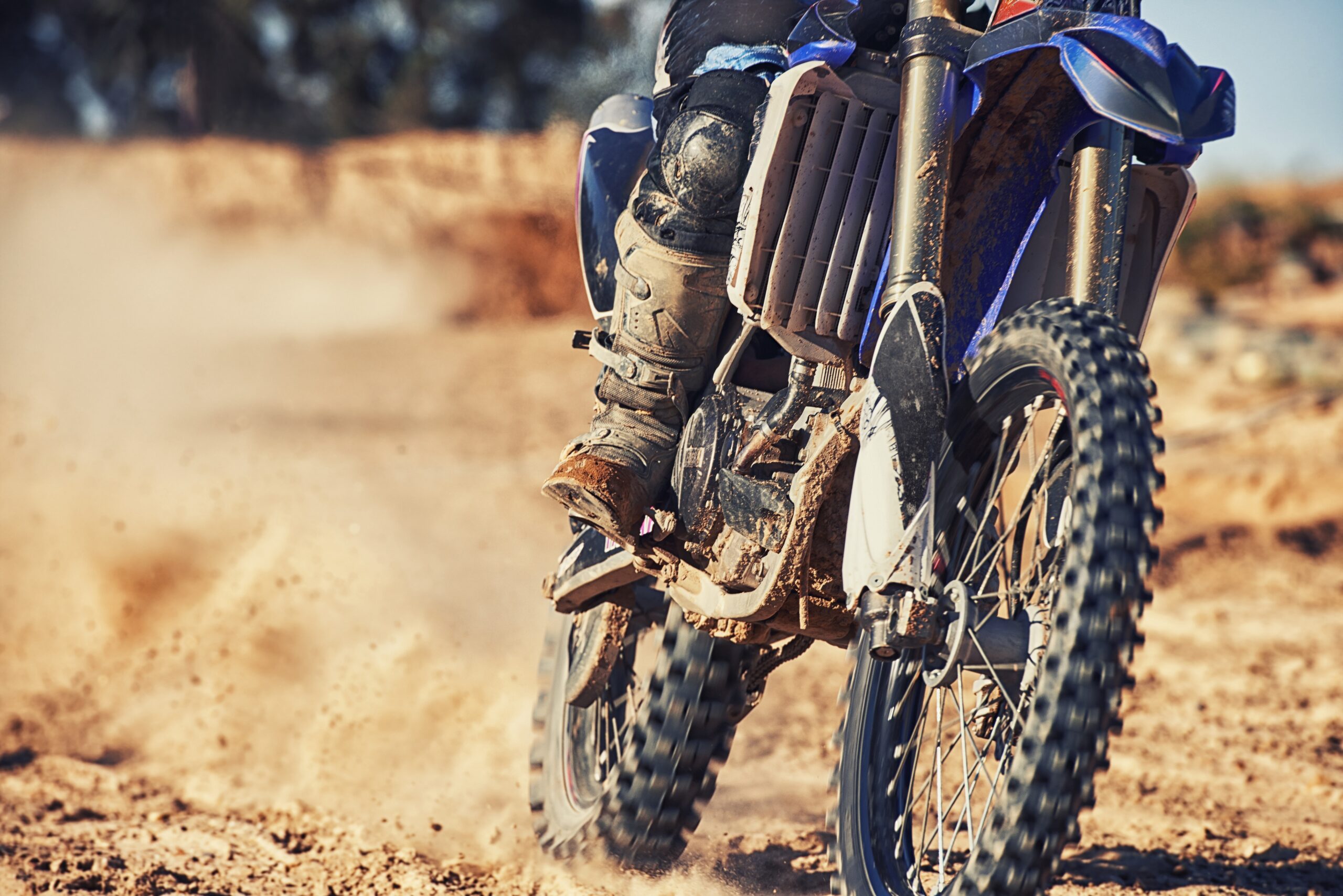 Closeup,,Dirt,Track,And,Wheels,Of,Motorcyclist,With,Motorbike,For