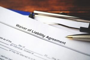 Legal,Document,Waiver,Of,Liability,Agreement,On,Paper,Close,Up.